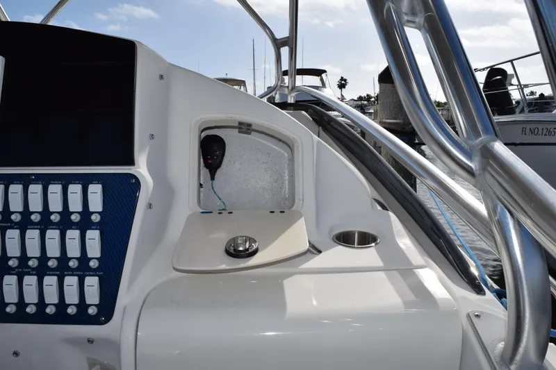 Slide: The Image of 2008 Hydra-Sports Vector 3300 VX boat cockpit with control panel and seating. - 93