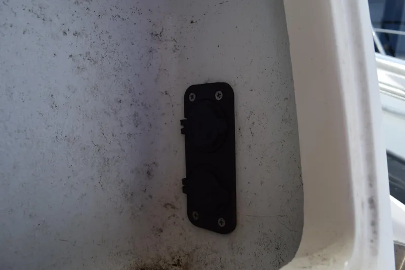 Slide: The Image of 2008 Hydra-Sports Vector 3300 VX storage compartment with Garmin device and speaker. - 97