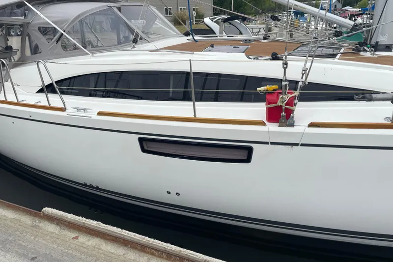 Slide: The Image of 2013 Bavaria Vision 42 sailboat docked, featuring sleek design and modern fittings. - 22