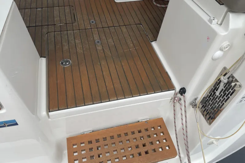 Slide: The Image of Bavaria Vision 42 yacht deck, 2013 model, featuring teak flooring and nautical equipment. - 24