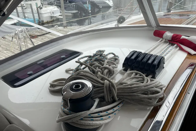 Slide: The Image of Deck of 2013 Bavaria Vision 42 sailboat with ropes and winch at marina. - 32