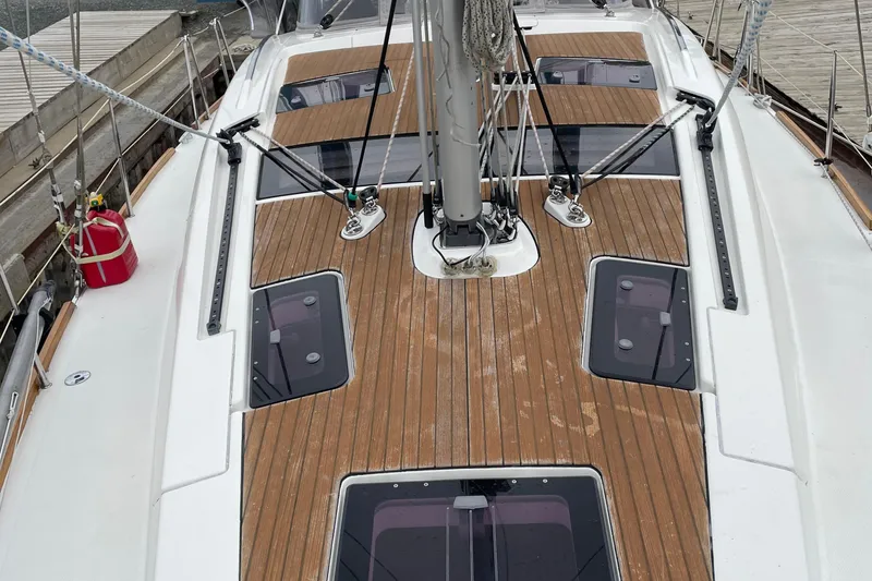Slide: The Image of Deck of 2013 Bavaria Vision 42 sailboat with wooden finish and hatches. - 42