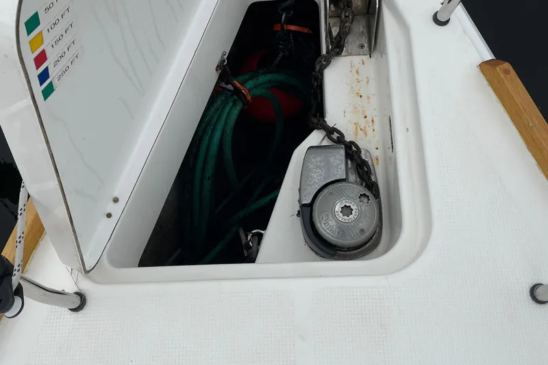 Slide: The Image of Anchor locker of 2013 Bavaria Vision 42 sailboat with chain and hose storage. - 43