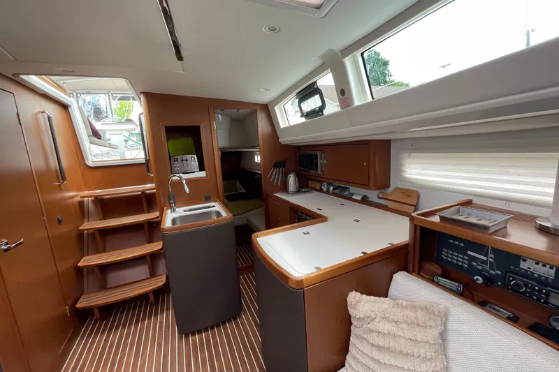 Slide: The Image of Interior of 2013 Bavaria Vision 42 yacht with modern kitchen and wooden finishes. - 44