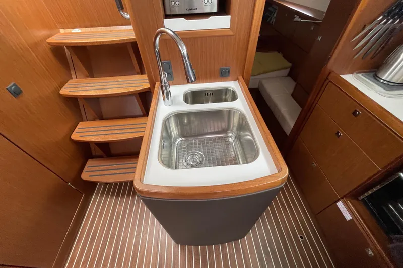 Slide: The Image of Interior of 2013 Bavaria Vision 42 yacht featuring a modern kitchen sink area. - 45