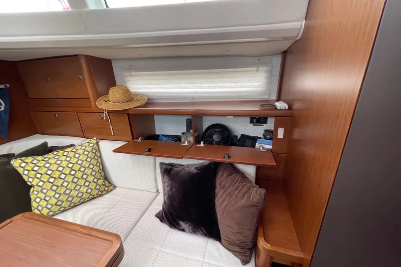 Slide: The Image of Interior of 2013 Bavaria Vision 42 yacht with cozy seating and wooden cabinetry. - 53