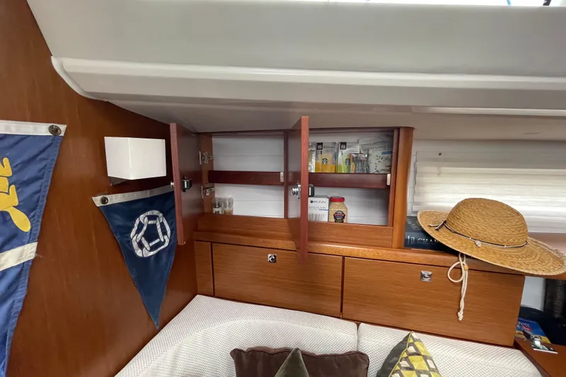 Slide: The Image of Interior of 2013 Bavaria Vision 42 yacht with wooden cabinets and nautical decor. - 54