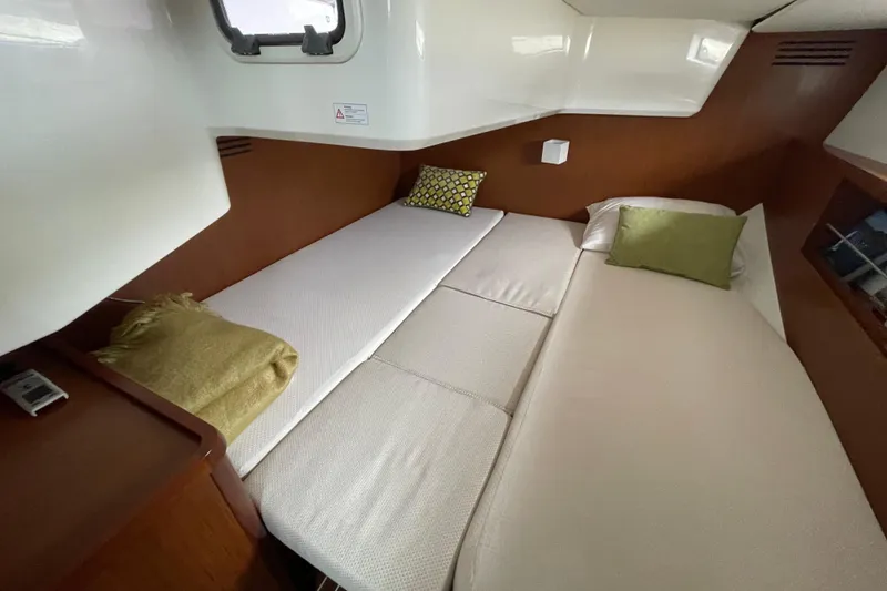 Slide: The Image of Cozy cabin interior of 2013 Bavaria Vision 42 yacht with twin beds and cushions. - 58