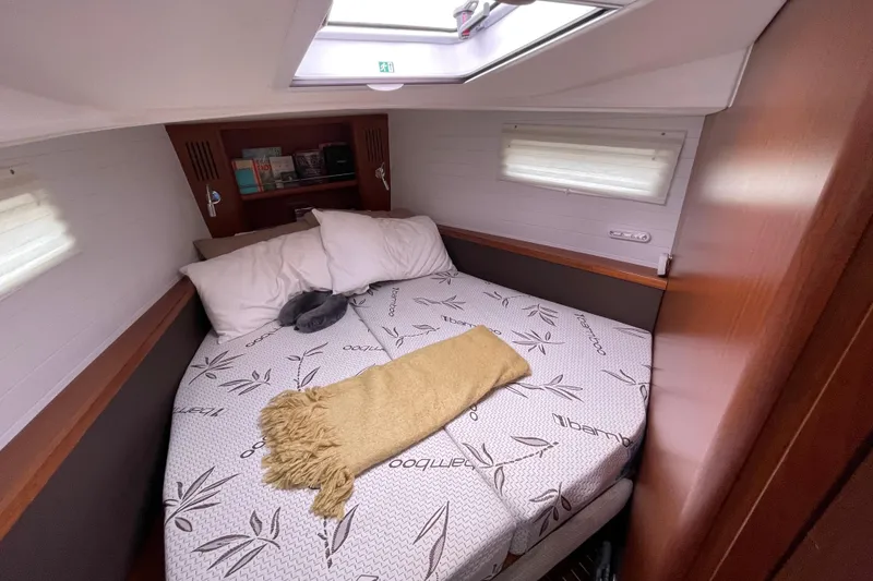 Slide: The Image of Cozy cabin interior of 2013 Bavaria Vision 42 yacht with bed and skylight. - 64