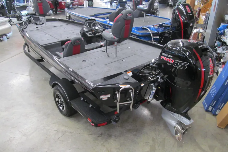 Slide: The Image of 2026 Ranger RT198P boat with Mercury Pro XS 150 engine in showroom. - 4