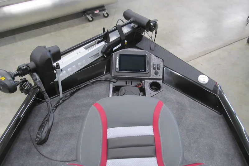 Slide: The Image of 2026 Ranger RT198P boat interior with navigation system and seating. - 7