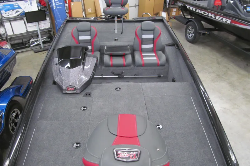 Slide: The Image of 2026 Ranger RT198P boat interior with gray and red seating, spacious deck, and modern design. - 8