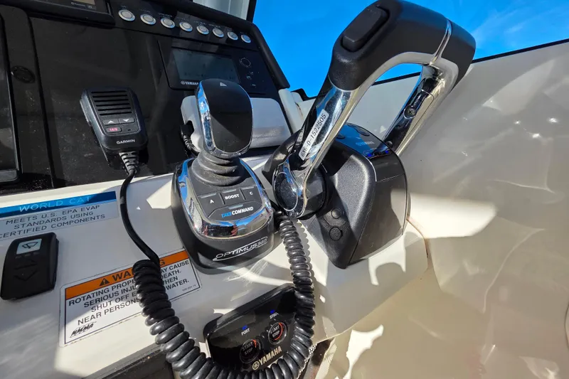 Slide: The Image of Control panel of 2018 World Cat 280 DC-X boat with Garmin and Yamaha equipment. - 12