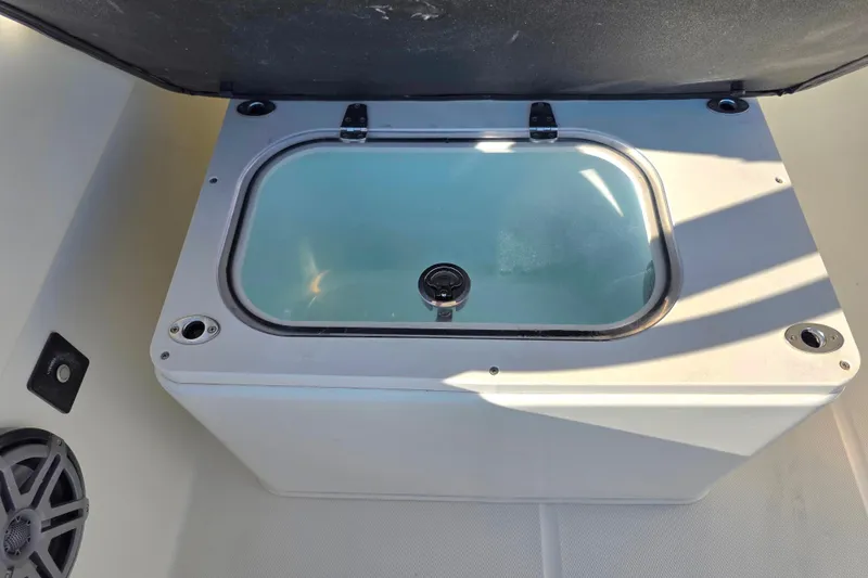 Slide: The Image of Livewell on 2018 World Cat 280 DC-X boat, open lid, interior view. - 24