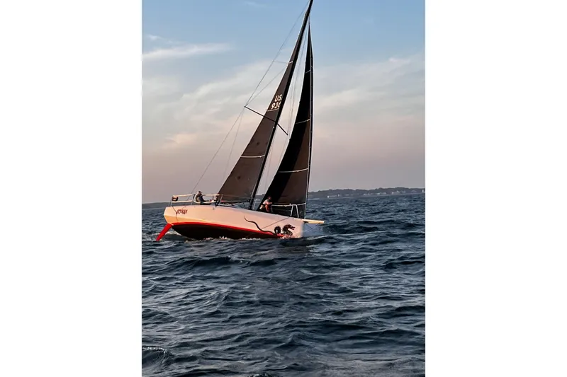 Slide: The Image of Sailing Dehler 30 OD yacht on open water at sunset, 2020 model. - 1