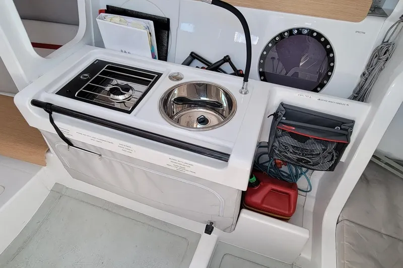 Slide: The Image of Compact galley in 2020 Dehler 30 OD sailboat with stove, sink, and storage. - 15