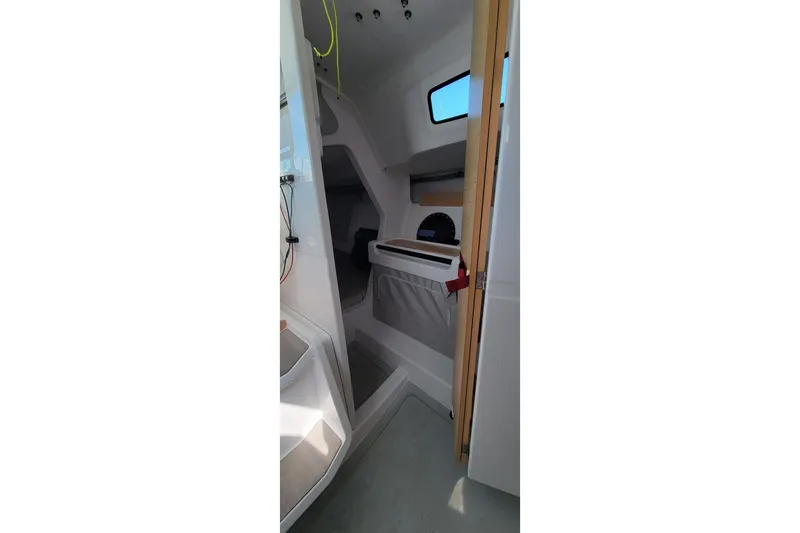 Slide: The Image of Interior of 2020 Dehler 30 OD sailboat, featuring compact cabin space and modern design. - 18