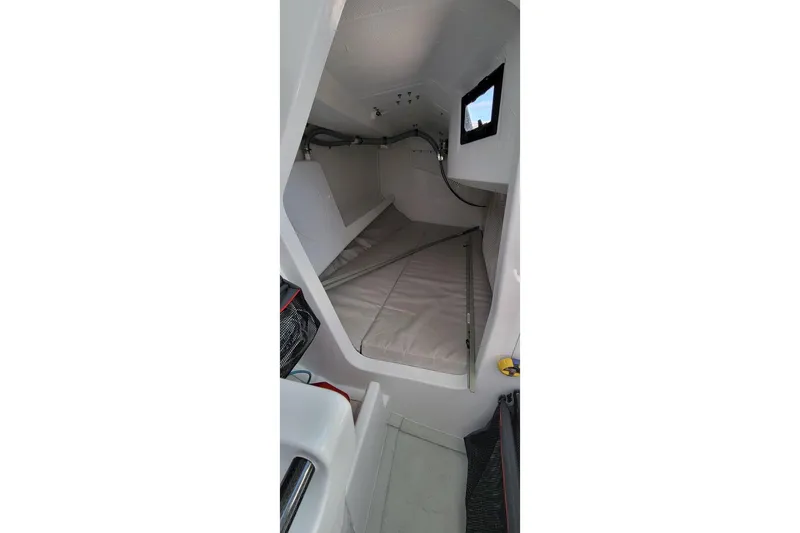 Slide: The Image of Interior cabin of 2020 Dehler 30 OD sailboat, featuring a compact sleeping area. - 20