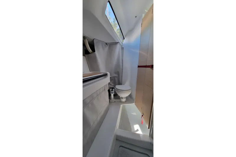 Slide: The Image of Interior of 2020 Dehler 30 OD sailboat bathroom with compact design and modern fixtures. - 25