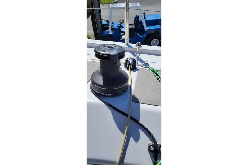 Slide: The Image of Winch on 2020 Dehler 30 OD sailboat deck with ropes and cleats. - 8