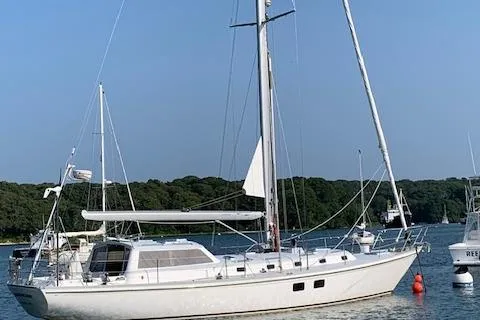 Slide: The Image of Sailing yacht Little Harbor 51 Pilothouse, 1995, gliding on open sea under blue sky. - 1