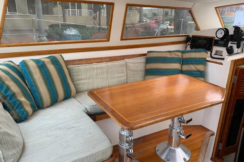Slide: The Image of 1995 Little Harbor 51 Pilothouse interior with navigation equipment and seating area. - 16