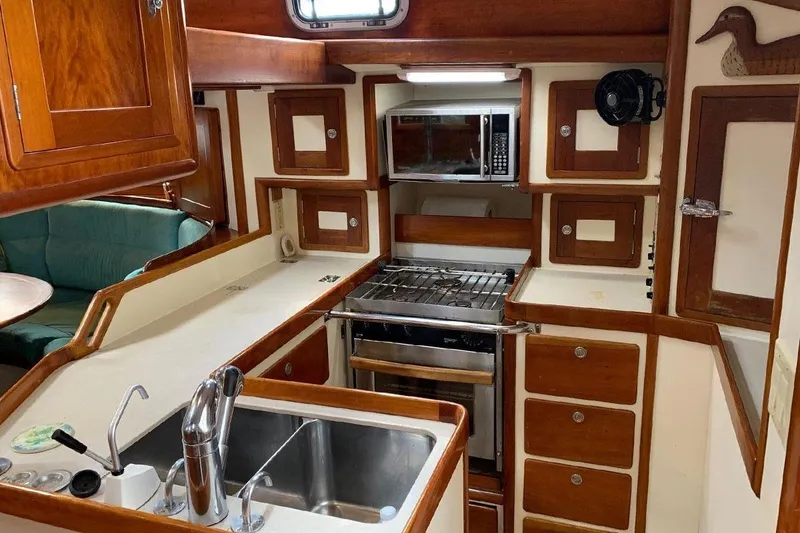Slide: The Image of Bathroom interior of 1995 Little Harbor 51 Pilothouse yacht, featuring sink and toilet. - 18