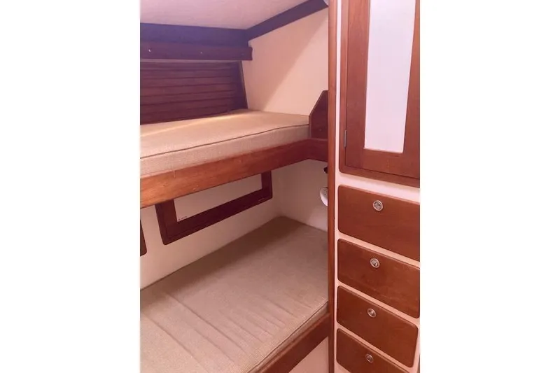 Slide: The Image of Wooden table with cup holders on a 1995 Little Harbor 51 Pilothouse yacht. - 25