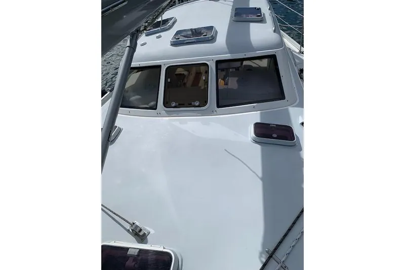 Slide: The Image of Interior of 1995 Little Harbor 51 Pilothouse with wooden bunk beds and storage. - 26