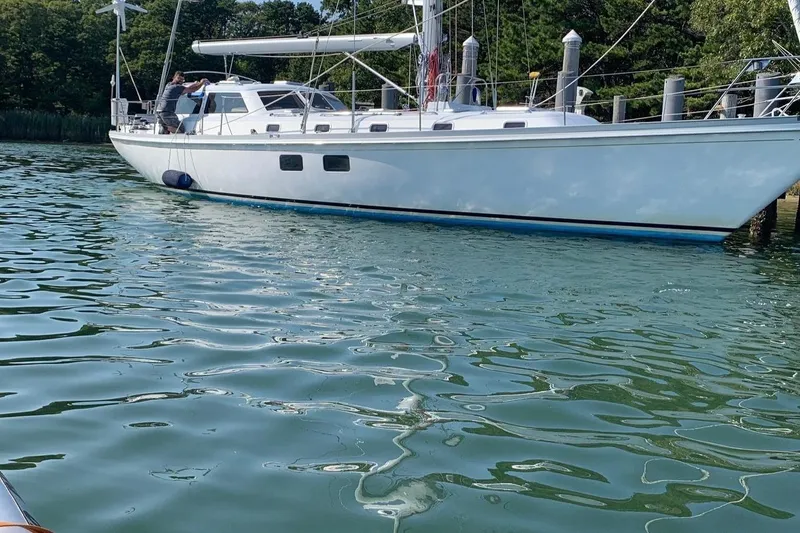 Slide: The Image of 1995 Little Harbor 51 Pilothouse yacht kitchen with wood cabinetry and stainless steel sink. - 30