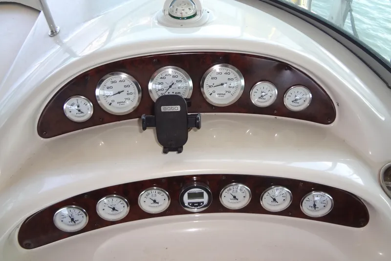 Slide: The Image of Dashboard of a 2000 Monterey 302 Cruiser with gauges and controls. - 20