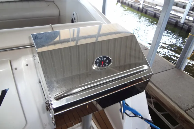 Slide: The Image of Stainless steel grill on 2000 Monterey 302 Cruiser boat deck. - 30