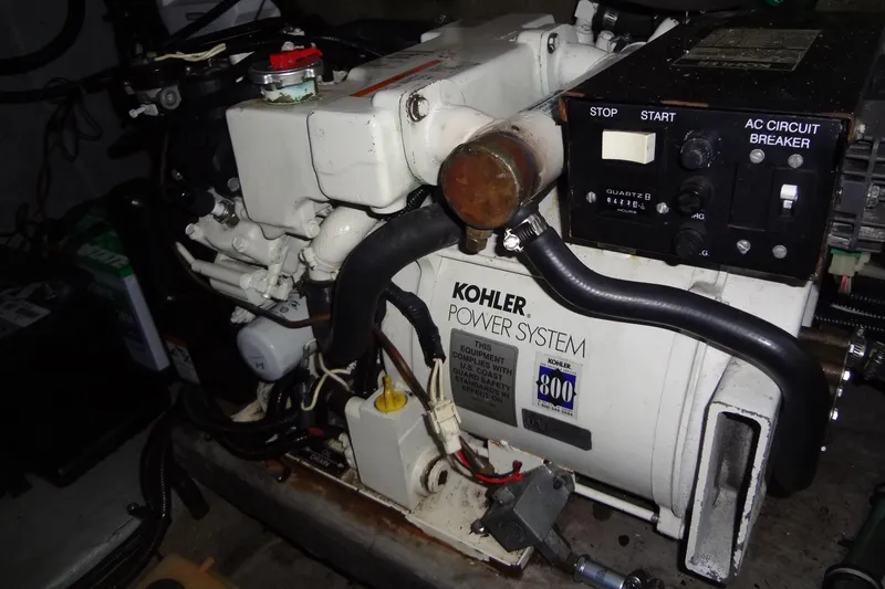 Slide: The Image of Kohler power system in 2000 Monterey 302 Cruiser boat engine compartment. - 49