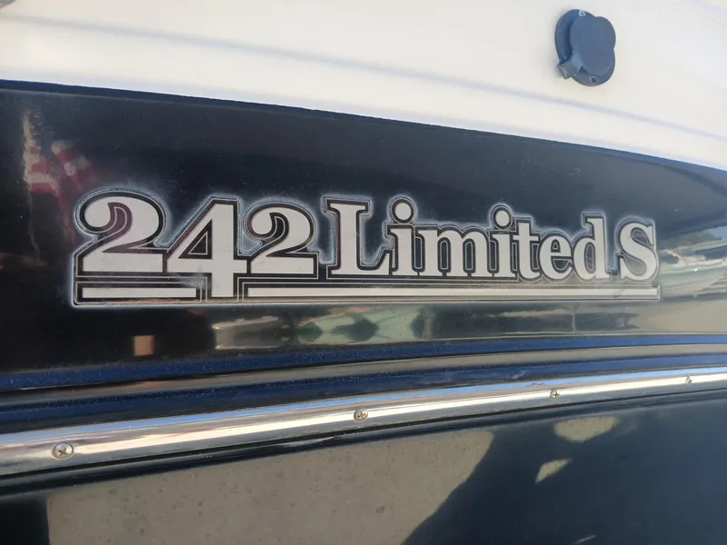 Slide: The Image of 2010 Yamaha Boats 242 Limited dashboard with steering wheel and gauges. - 11