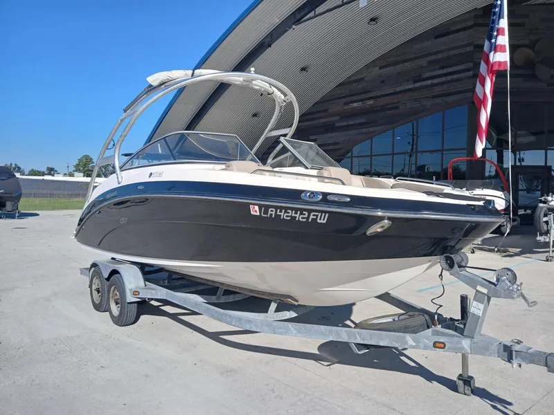 Slide: The Image of 2010 Yamaha Boats 242 Limited engine compartment with dual engines visible. - 12