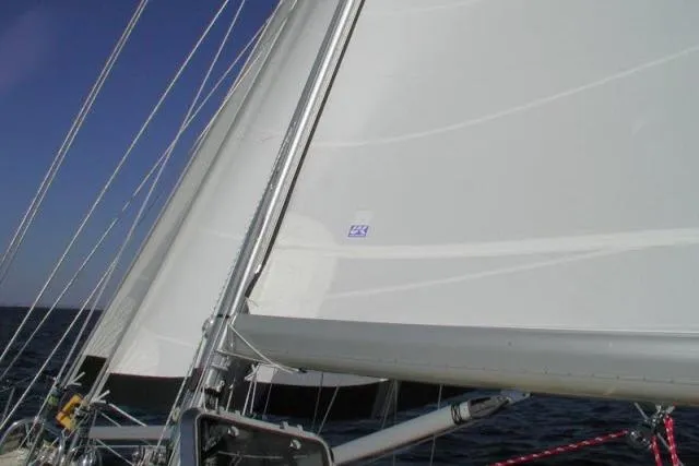 Slide: The Image of Sailing yacht Tayana 460 Vancouver Pilothouse, 2002, with sails unfurled on open water. - 109