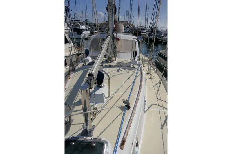 Slide: The Image of 2002 Tayana 460 Vancouver Pilothouse sailboat deck with rigging in marina. - 71