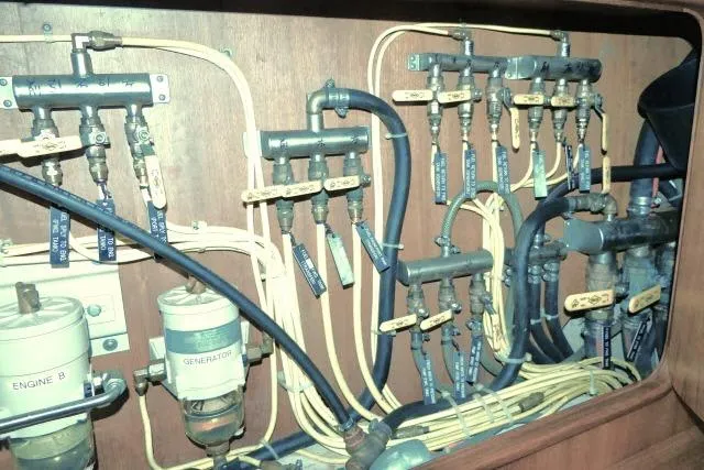 Slide: The Image of Electrical panel and wiring in a 2002 Tayana 460 Vancouver Pilothouse yacht. - 95