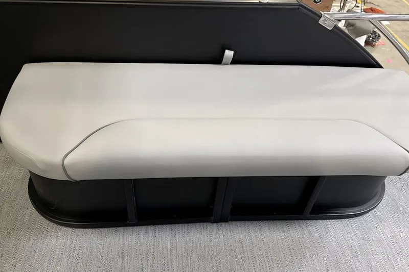 Slide: The Image of 2026 Godfrey Sweetwater 22' Tritoon bench seat, white upholstery, sleek design. - 7