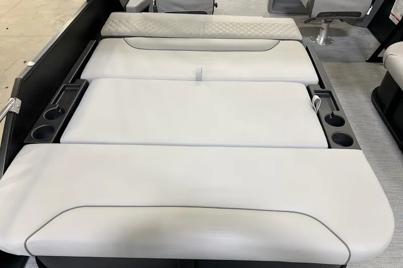 Slide: The Image of 2026 Godfrey Sweetwater 22' Tritoon lounge seating with cup holders and quilted design. - 8