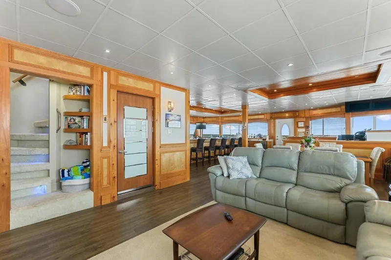 Slide: The Image of Luxurious interior of 2018 Avenger Custom Catamaran with elegant seating and wooden accents. - 10