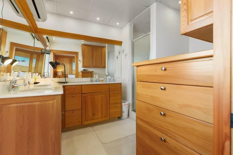 Slide: The Image of Luxurious wooden bathroom interior on 2018 Avenger Custom Luxury Catamaran Coastal Cruiser. - 23