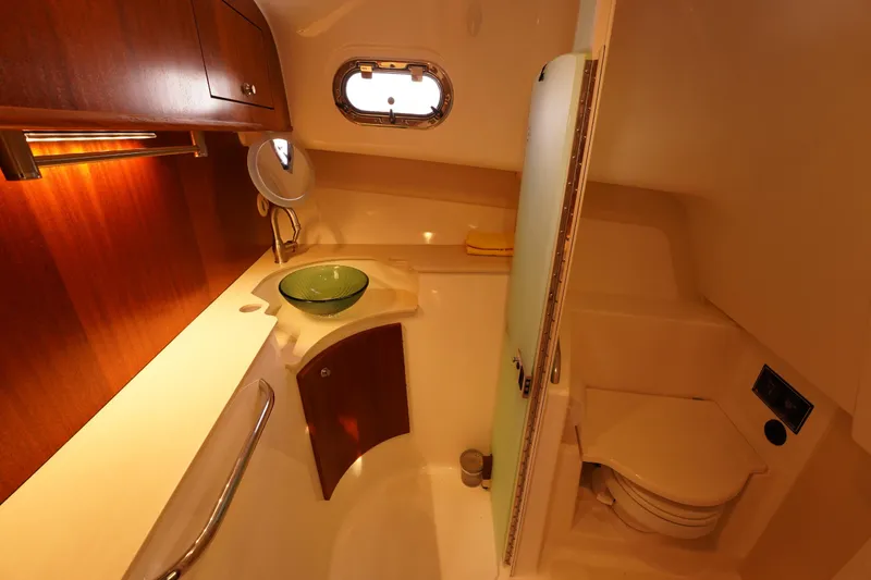 Slide: The Image of Luxurious bathroom interior of 2015 Pursuit OS 385 Offshore boat with modern fixtures. - 53