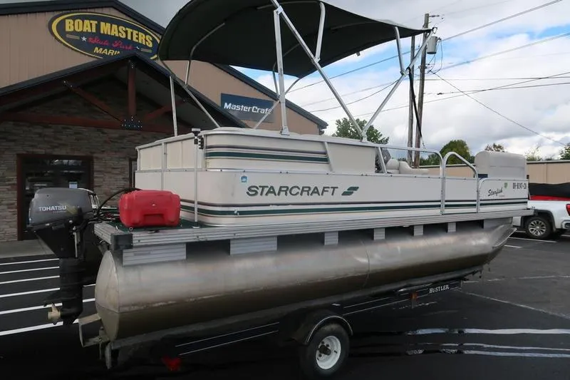 Slide: The Image of 1999 Starcraft Starfish 180 pontoon boat on trailer at Boat Masters Marina. - 5