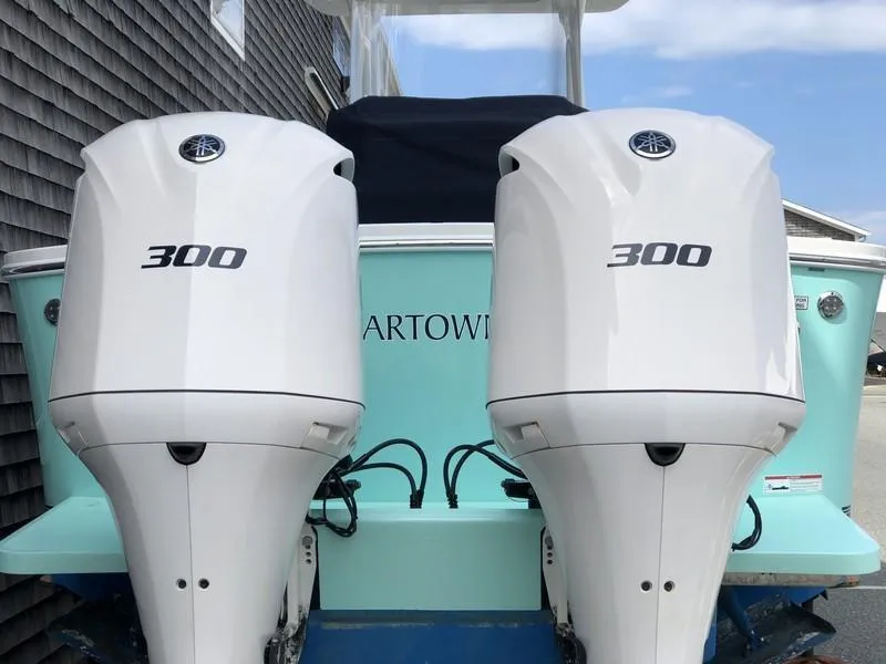 Slide: The Image of 2018 Regulator 31 boat with twin 300 horsepower outboard engines. - 8