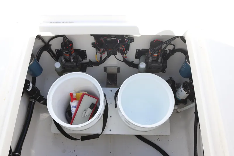 Slide: The Image of 2020 Regulator 31 boat storage compartment with equipment and supplies. - 11