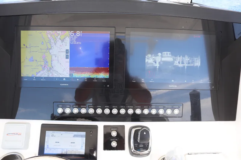 Slide: The Image of Control panel of a 2020 Regulator 31 boat with Garmin displays. - 17