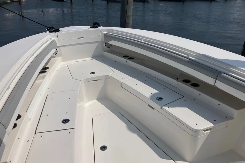 Slide: The Image of 2020 Regulator 31 boat interior with spacious seating and storage compartments. - 20