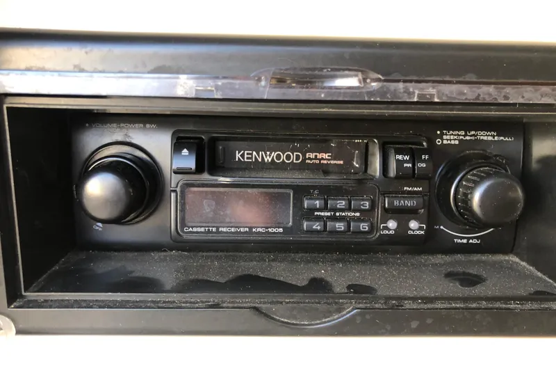 Slide: The Image of Kenwood cassette receiver in a 1992 Maxum 2300 SC boat dashboard. - 11
