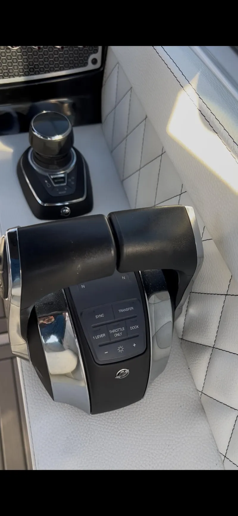 Slide: The Image of Dashboard display of a 2020 Cruisers Yachts 338OB, showing digital gauges and controls. - 21